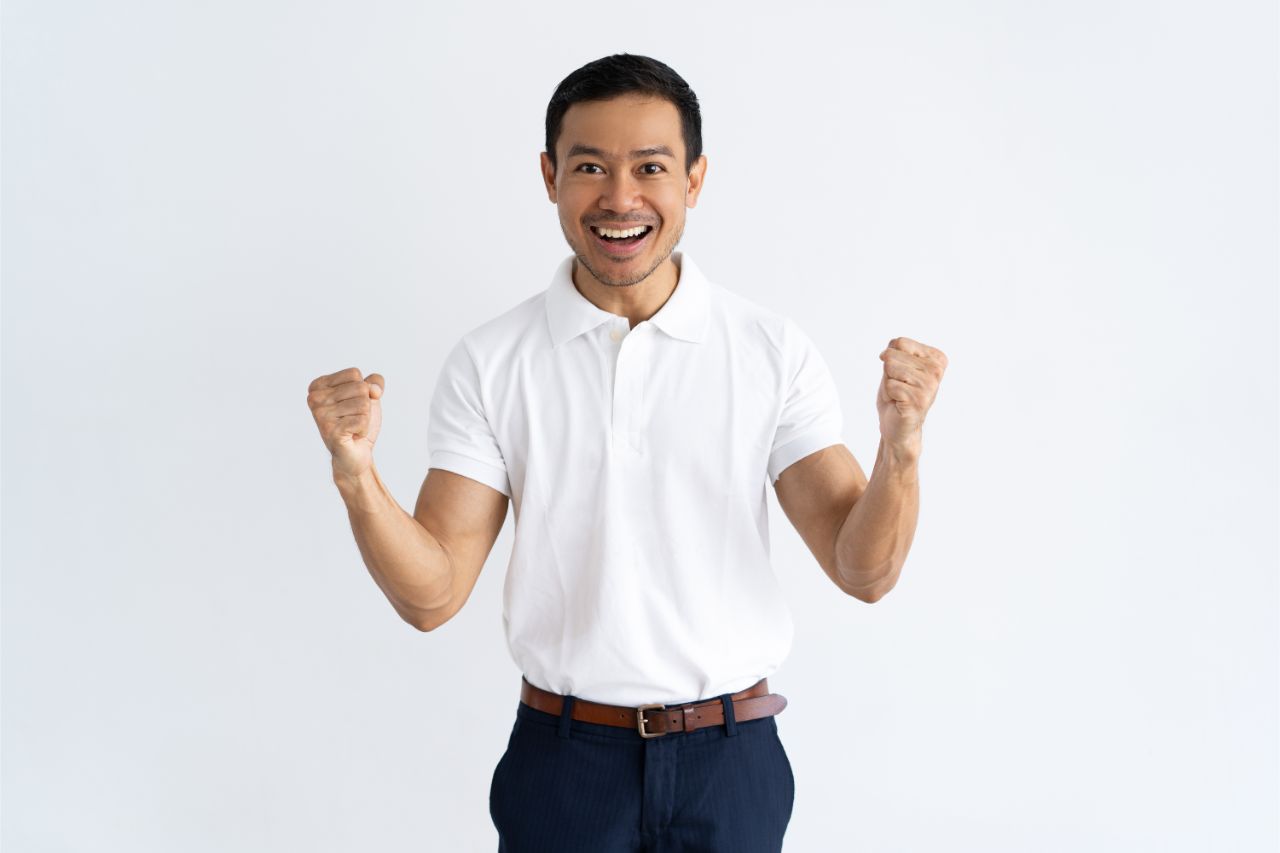 Happy man wearing a white polo shirt