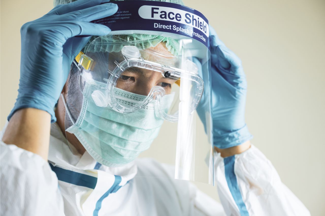 Man wearing a face shield